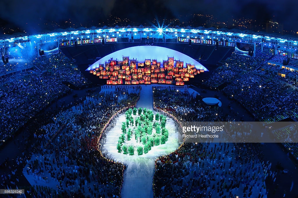 RIO DE JANEIRO, BRAZIL - AUGUST 05: The Olympic Rings are formed in green foliage during the Opening Ceremony of the Rio 2016 Olympic Games at Maracana Stadium on August 5, 2016 in Rio de Janeiro, Brazil. (Photo by Richard Heathcote/Getty Images)