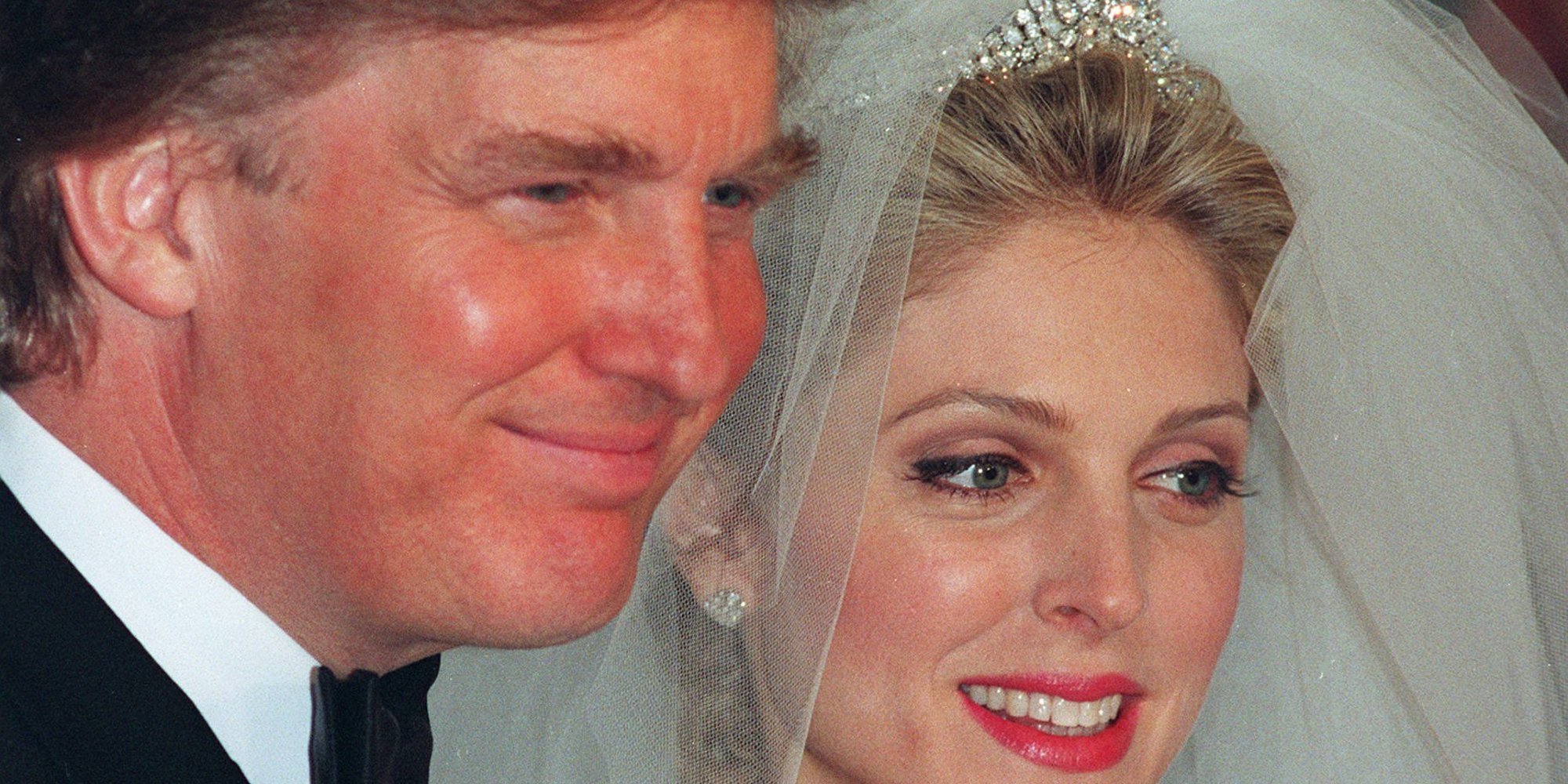 FILE--Donald Trump and Marla Maples pose for photographers following their wedding ceremony in New York, as seen in this December 1993 file photo. Trump and Maples, his wife of three years, are on the verge of breaking up, the New York Post reported Friday, May 2, 1997. ``Donald wants out. He's looking for his freedom,'' the newspaper said, quoting unidentified sources. (AP Photo/Kathy Willens, File)