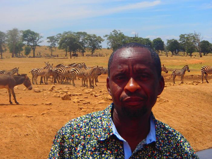man-brings-water-wild-animals-kenya-10-58aac6f3a007f__700