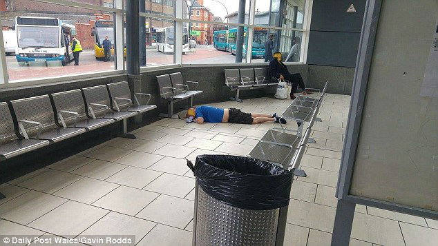 3E01102F00000578-4302806-Another_man_was_pictured_lying_face_down_on_the_floor_of_the_bus-a-49_1489182669495-w700