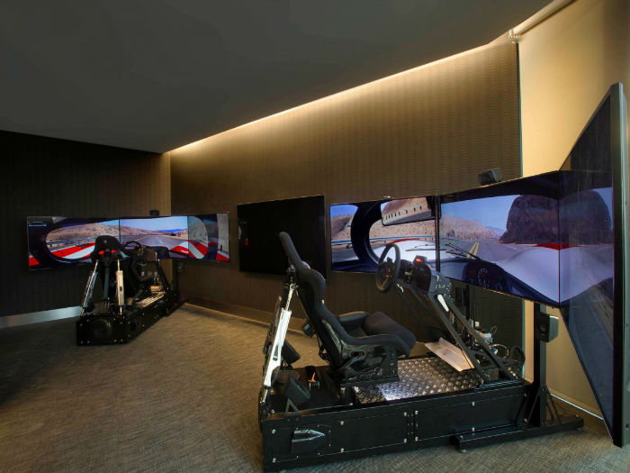 -and-a-game-room-complete-with-golf-and-racing-simulators-w700