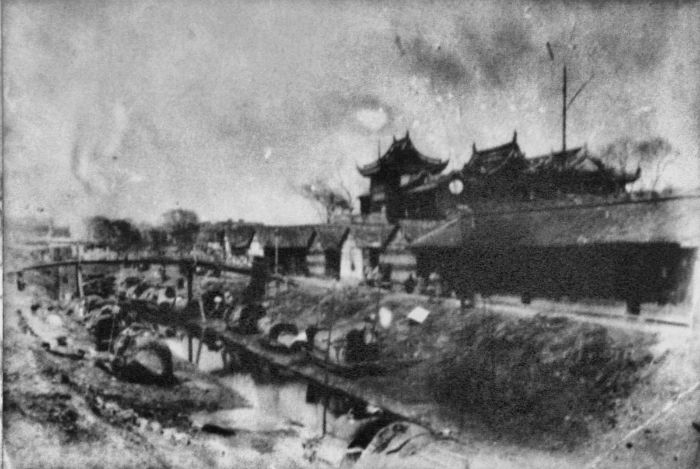the-old-city-of-shanghai--pictured-here-in-the-1880s--came-complete-with-moat-w700