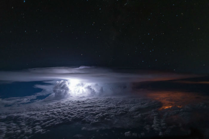 pilot-clouds-lightning-night-skies-santiago-borja-lopez-10-591954c35ab9f__880-w700