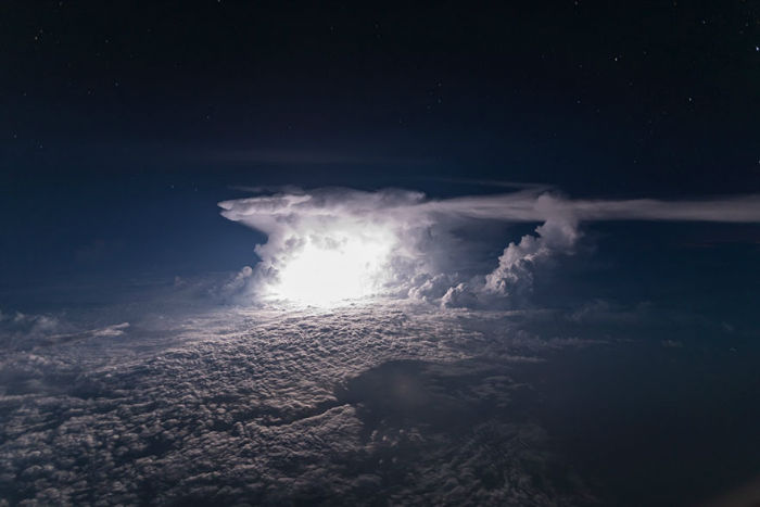 pilot-clouds-lightning-night-skies-santiago-borja-lopez-12-591954c76376a__880-w700