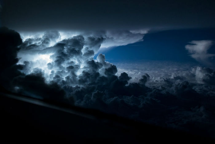 pilot-clouds-lightning-night-skies-santiago-borja-lopez-13-591954c95e9a6__880-w700
