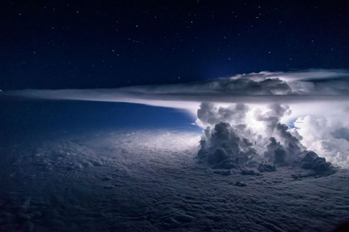 pilot-clouds-lightning-night-skies-santiago-borja-lopez-14-591954cc6616a__880-w700