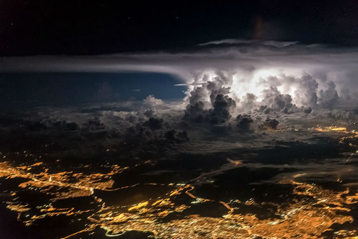 pilot-clouds-lightning-night-skies-santiago-borja-lopez-15-591954ce7e759__880-w700