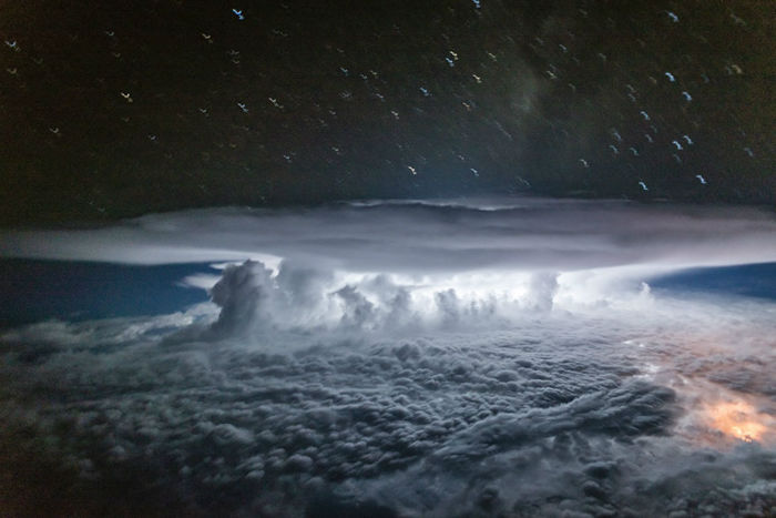 pilot-clouds-lightning-night-skies-santiago-borja-lopez-17-591954d264314__880-w700