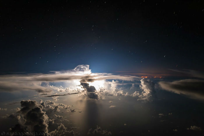 pilot-clouds-lightning-night-skies-santiago-borja-lopez-18-591954d55ad09__880-w700