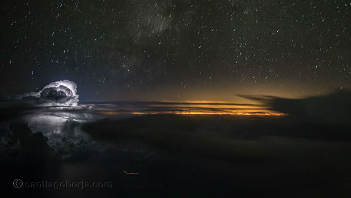 pilot-clouds-lightning-night-skies-santiago-borja-lopez-2-591954af34840__880-w700