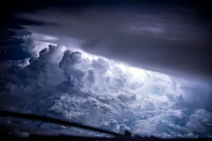 pilot-clouds-lightning-night-skies-santiago-borja-lopez-4-591954b75f0cb__880-w700