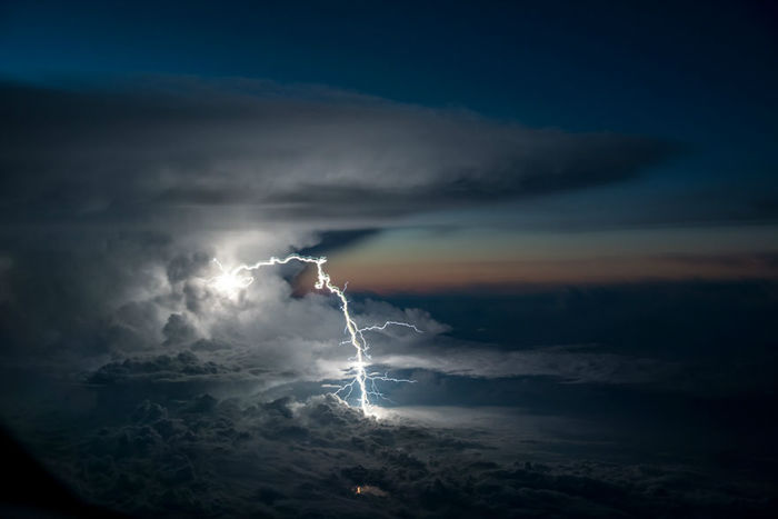 pilot-clouds-lightning-night-skies-santiago-borja-lopez-9-591954c1449c1__880-w700