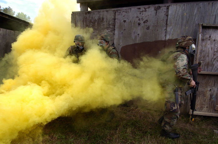 US_Navy_041027-N-2383B-129_U.S._Navy_combat_camera_personnel_wear_gas_masks_during_a_simulated_chemical_attack_during_Urban_Terrain_and_Close_Quarter_Combat_Tactical_Integration_field_training-w700