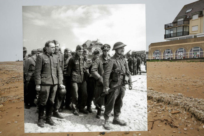 juno-beach-on-may-8-2014-in-bernieres-sur-mer-france-juxtaposed-with-a-canadian-soldier-at-the-head-of-a-group-of-german-prisoners-of-war-including-two-officers-on-juno-beach-on-june-6-1944-w700