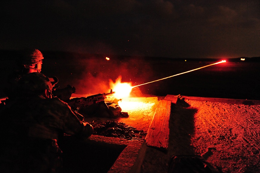 090425-A-2315M-407 U.S. Army soldiers assigned to 3rd Battalion, 157th Field Artillery, Colorado Army National Guard, light up the range with tracer rounds as they fire the M-240B medium machine gun with the help of night optics at Fort Hood, Texas, on April 25, 2009. The battalion, which arrived at its mobilization station on April 18, is deploying this summer in support of Operation Iraqi Freedom. DoD photo by Staff Sgt. Liesl Marelli, U.S. Army. (Released)
