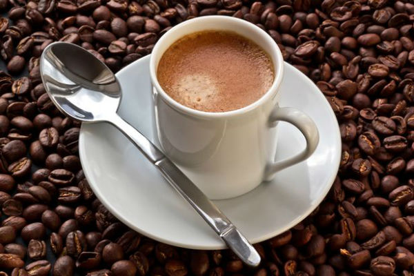 Espresso-coffee-on-coffee-beans-w600