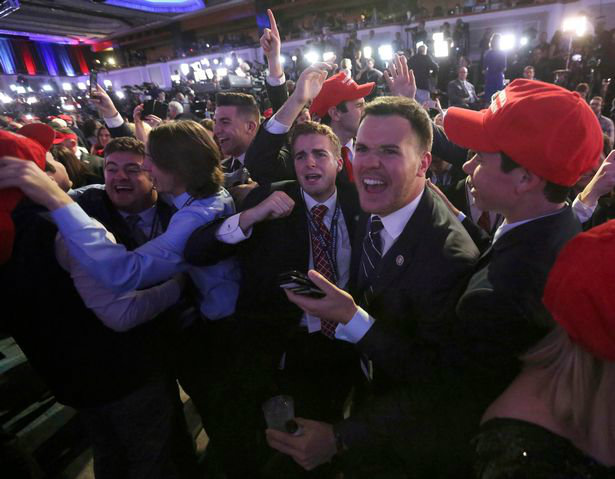 supporters-of-us-republican-presidential-nominee-donald-trump-react-at-his-election-night-rally-in-w700