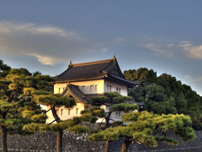 the-imperial-palace-sits-in-the-middle-of-tokyo-but-inside-of-a-vast-park-surrounded-by-a-moat-and-thick-stone-walls-its-home-to-japans-emperor-akihito-and-his-family-w700