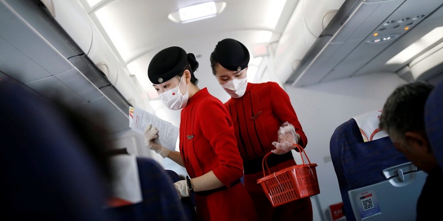 توصیه به پوشیدن پوشک به مهمانداران هواپیما در چین برای جلوگیری از ابتلا به کرونا