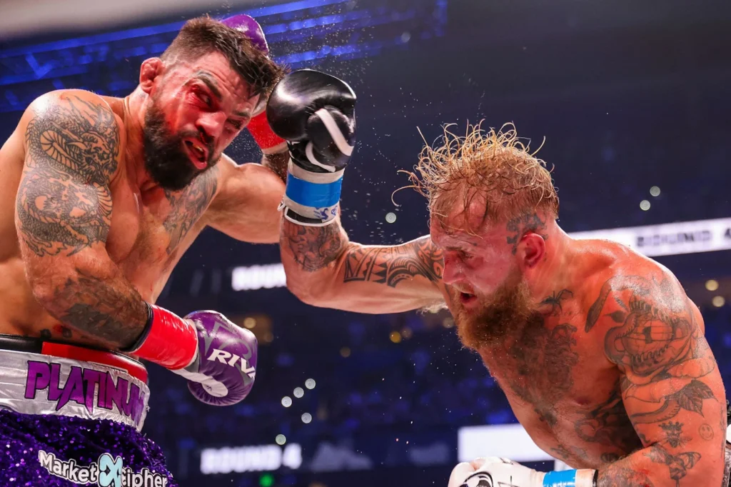 JAKE PAUL battered Mike Perry