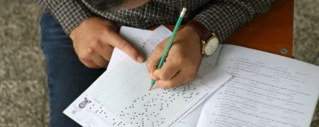 همه چیز در مورد کارنامه کنکور؛ از نمره کل آزمون اختصاصی تا نمره خام و تراز