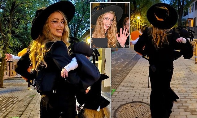 امبر هرد برای اولین بار با دوقلوهایش در مادرید اسپانیا دیده شد