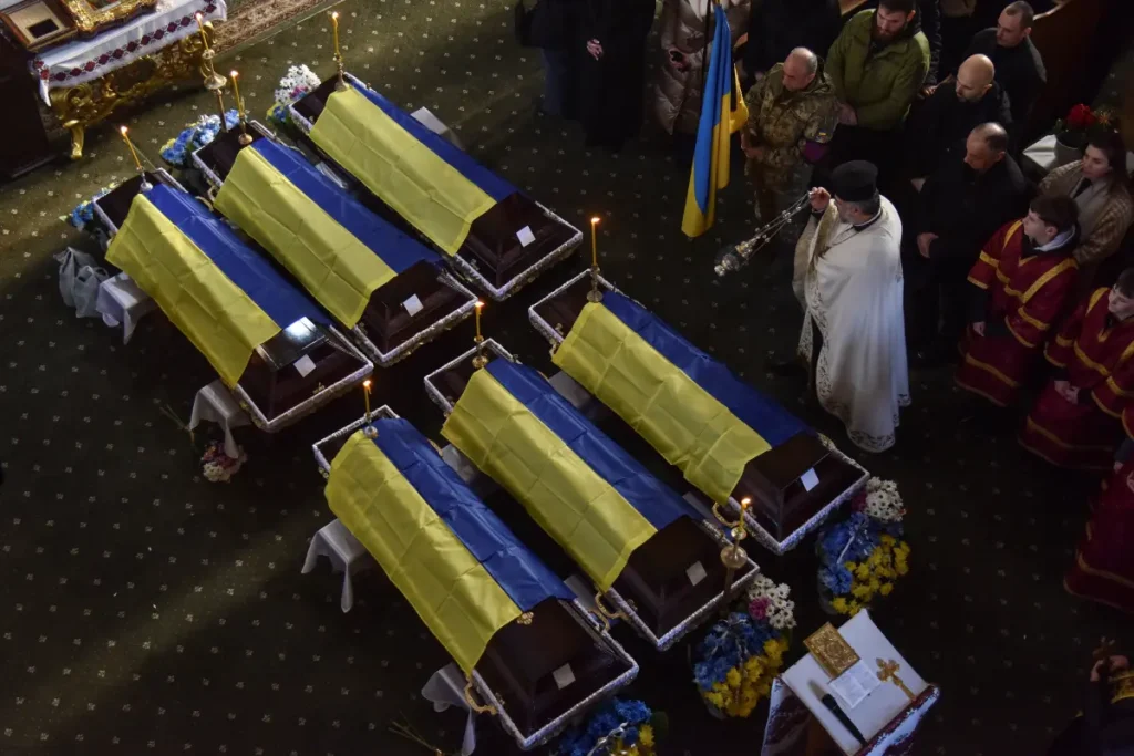 greek-catholic-priest-leads-funeral-117445161-1024x683.webp