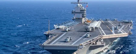 یک ناو هواپیمابر آمریکایی با چه سرعتی و طی چند روز به خاورمیانه می‌رسد؟